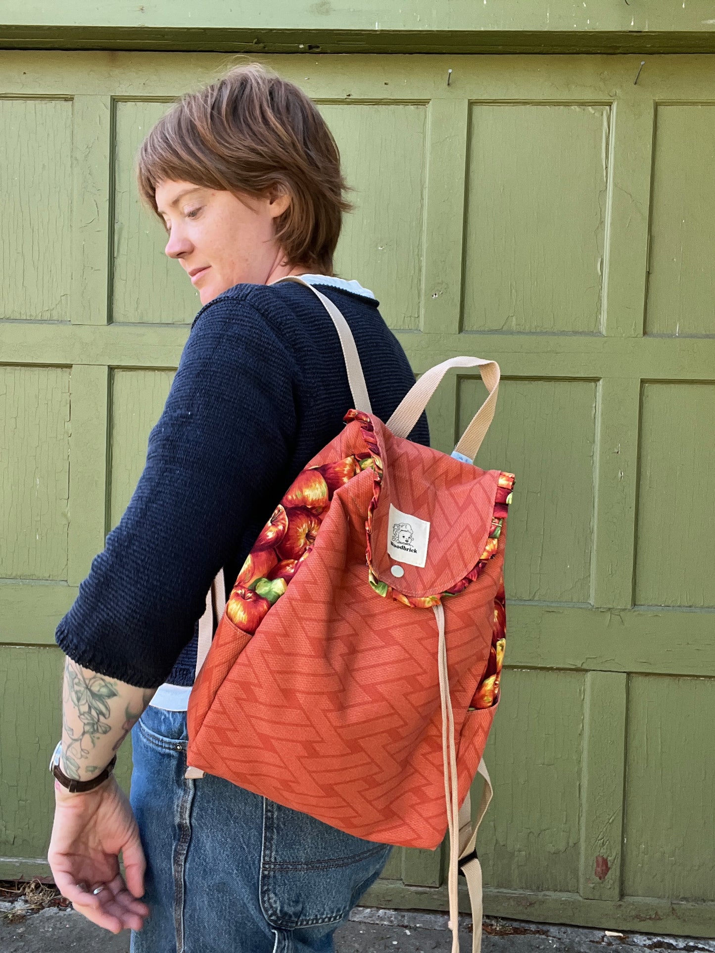 "Apples to Oranges"Exterior upholstery Drawstring Backpack