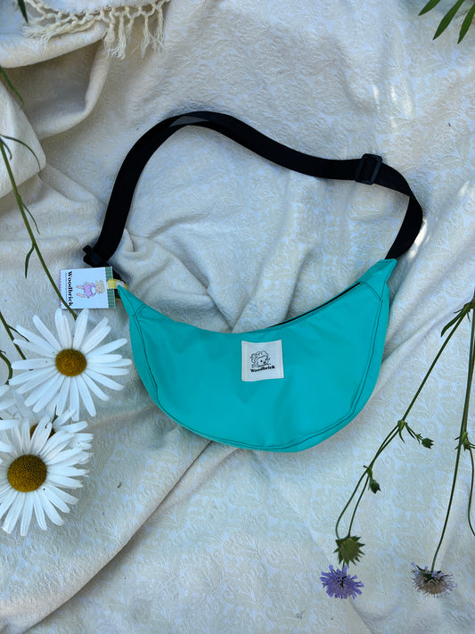 "Splashes of Teal" Water Resistant Sidekick Crescent Bag
