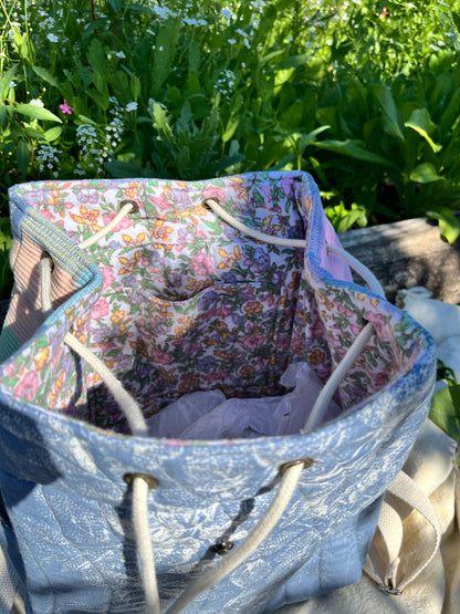 "Shimmering Water" Quilted Drawstring Backpack