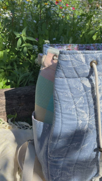 "Shimmering Water" Quilted Drawstring Backpack